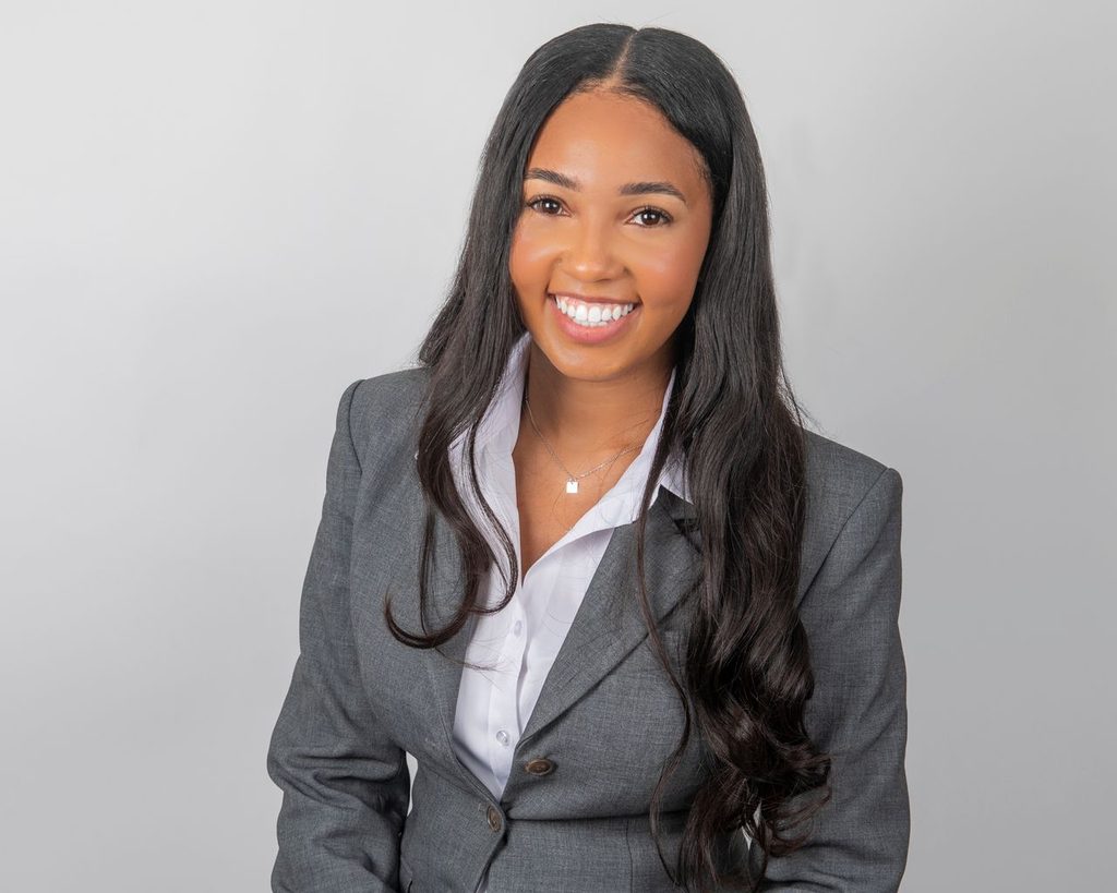 Studio headshot session in Houston with a gray backdrop by Pixel Studio Productions.